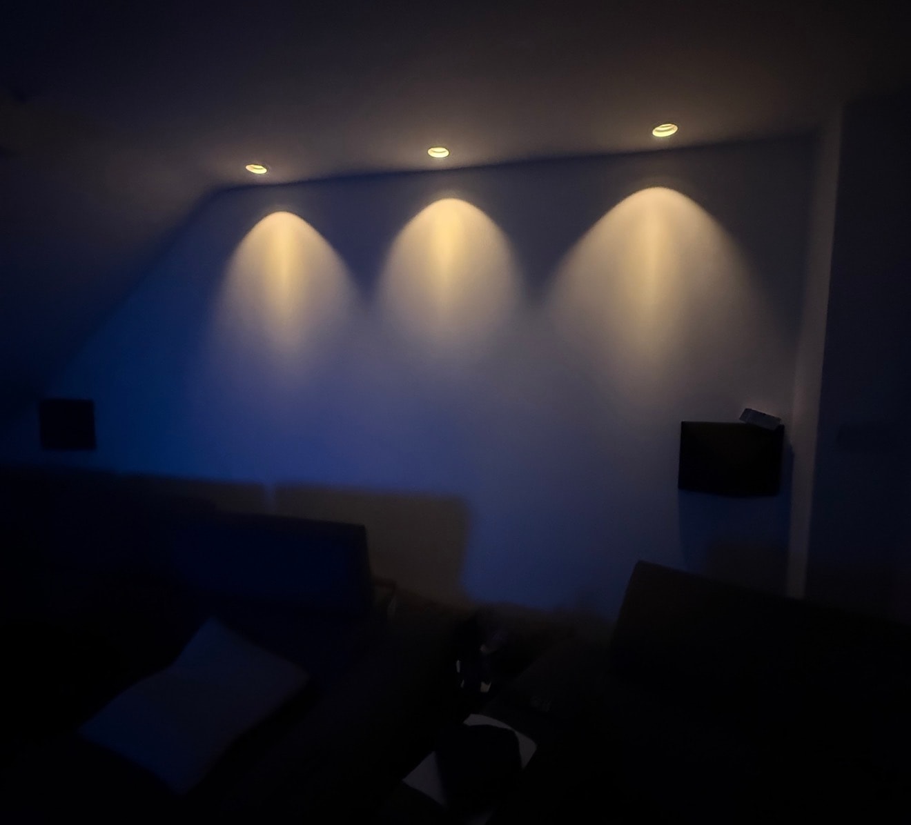 Home cinema room with blue ambient lighting