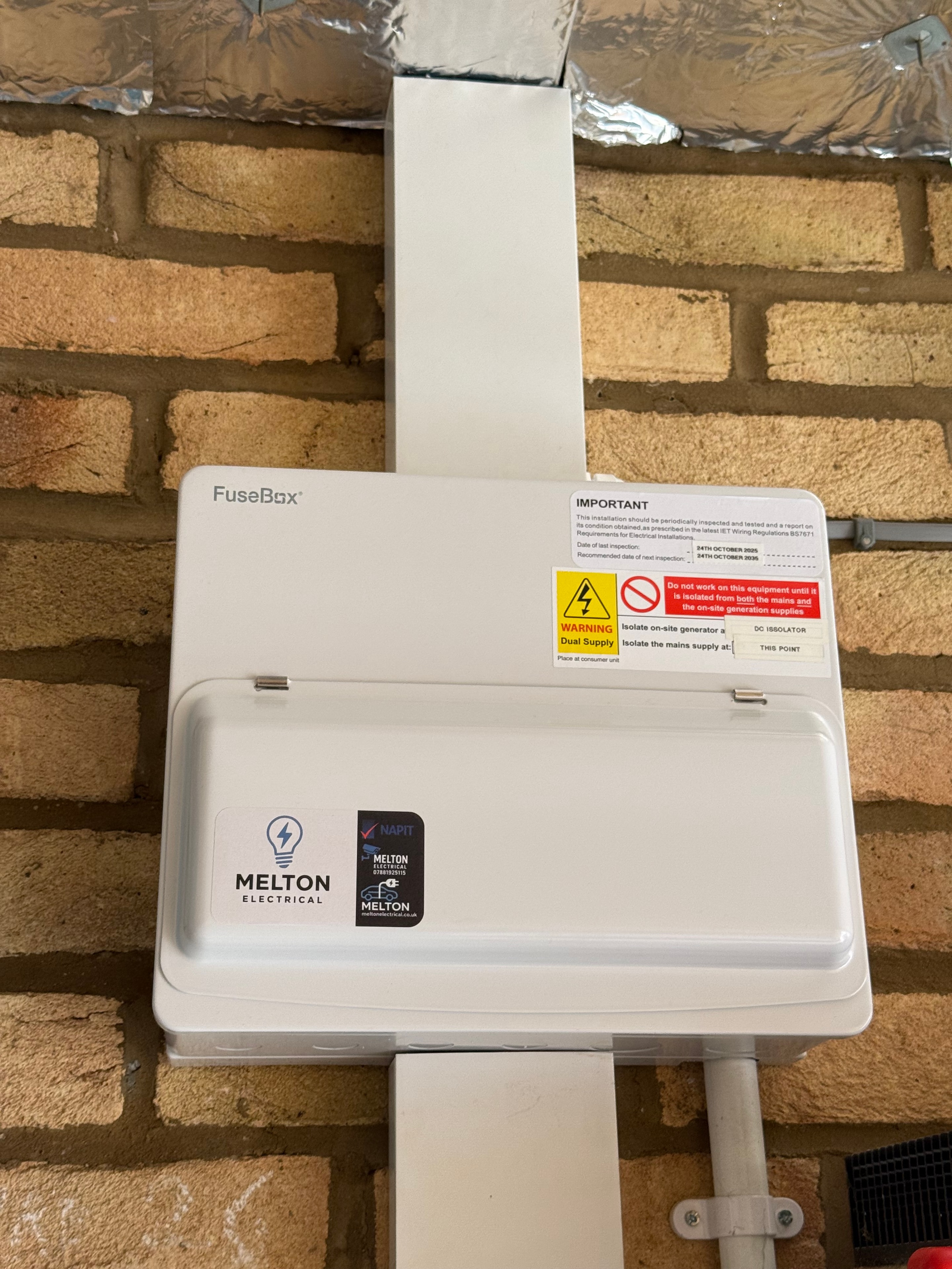 FuseBox consumer unit installed on brick wall