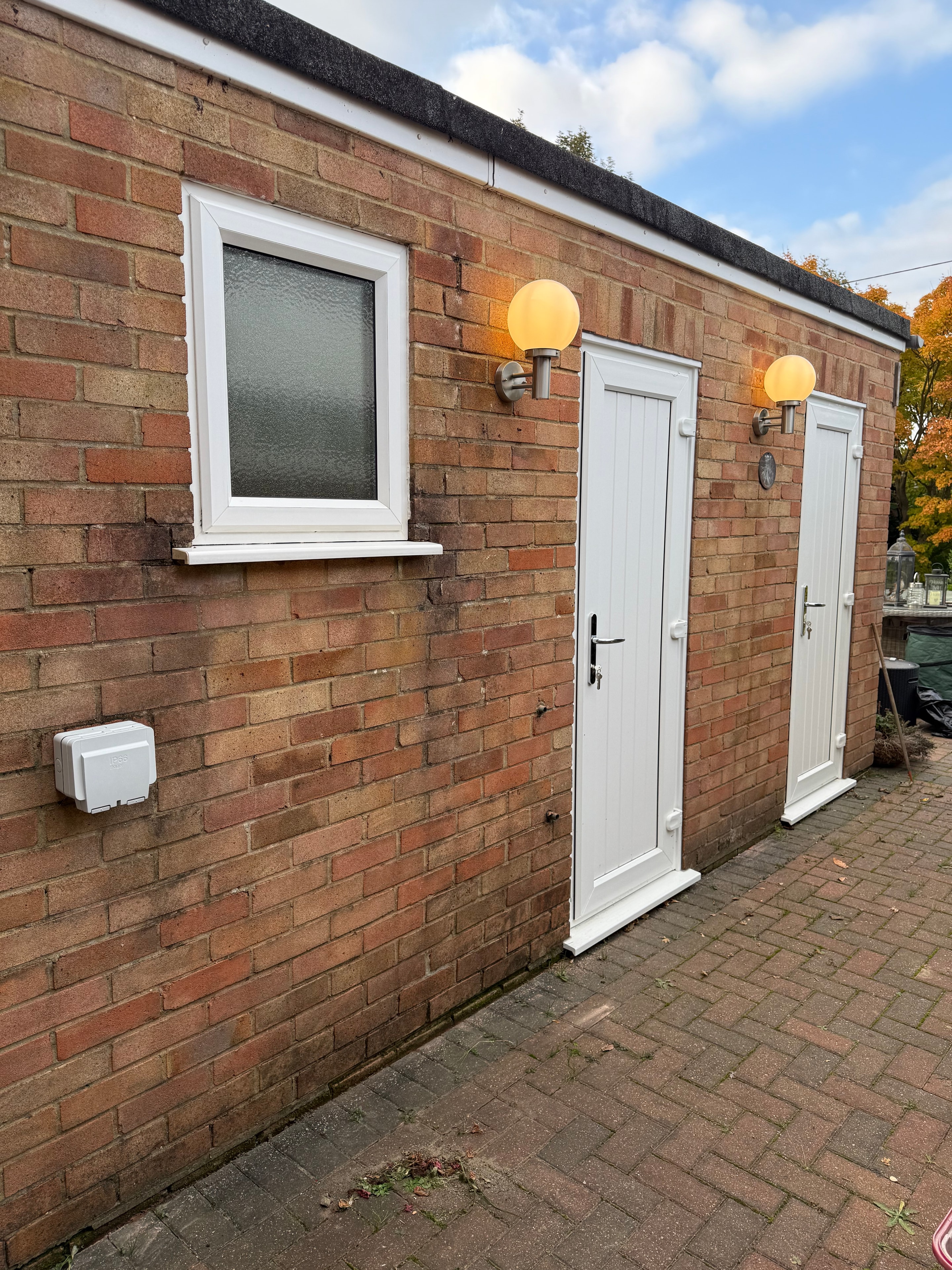 Garage exterior globe wall lights